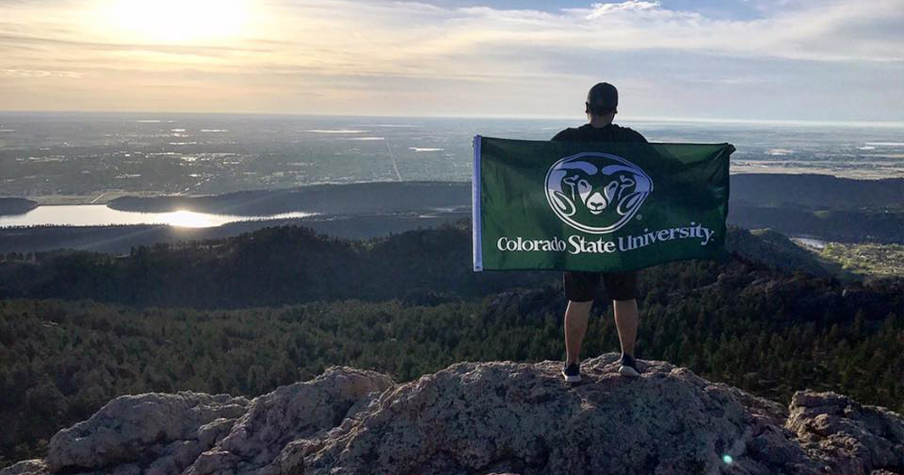 Miguel standing on Horsetooth Rock