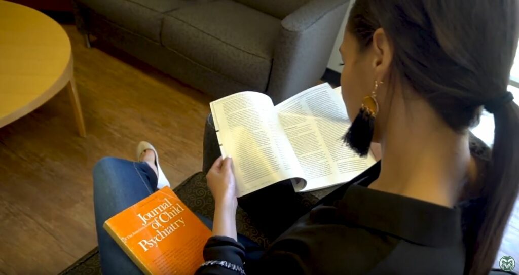 A student studies from a book.