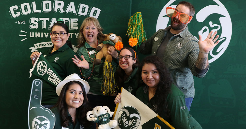 CSU staff and a future student celebrate admission