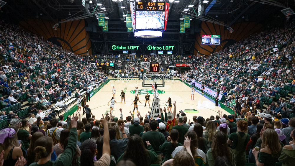 Students cheer on the Rams at a women's basketball game in Moby Arena.