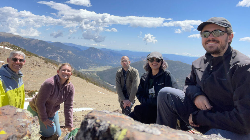 HIstory majors and professors explore historic sites in the mountains