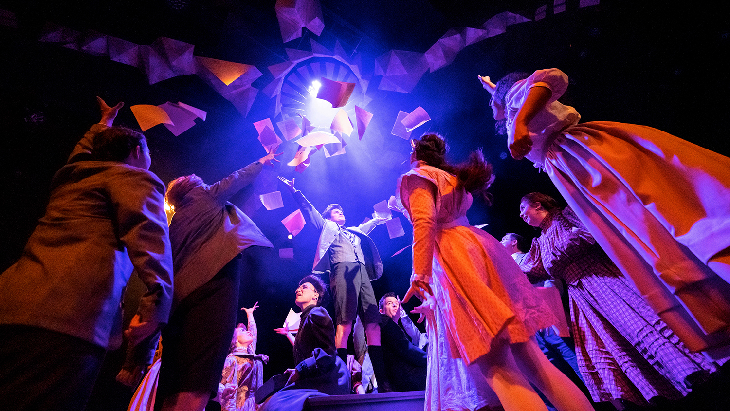 Students perform on stage