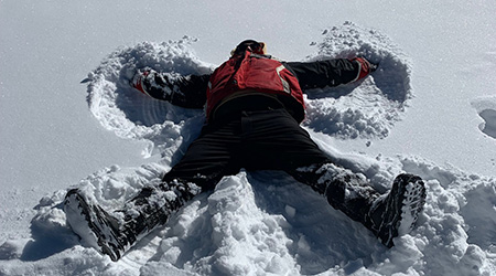 David doing snow angels