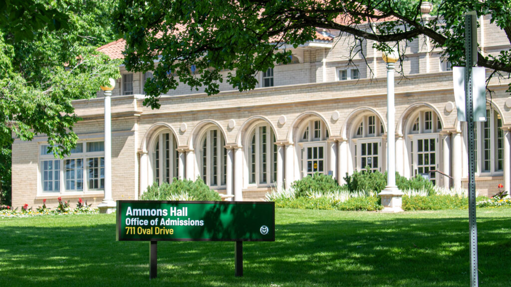 Exterior of building with large sign that reads Ammons Hall, Office of Admissions, 711 Oval Drive