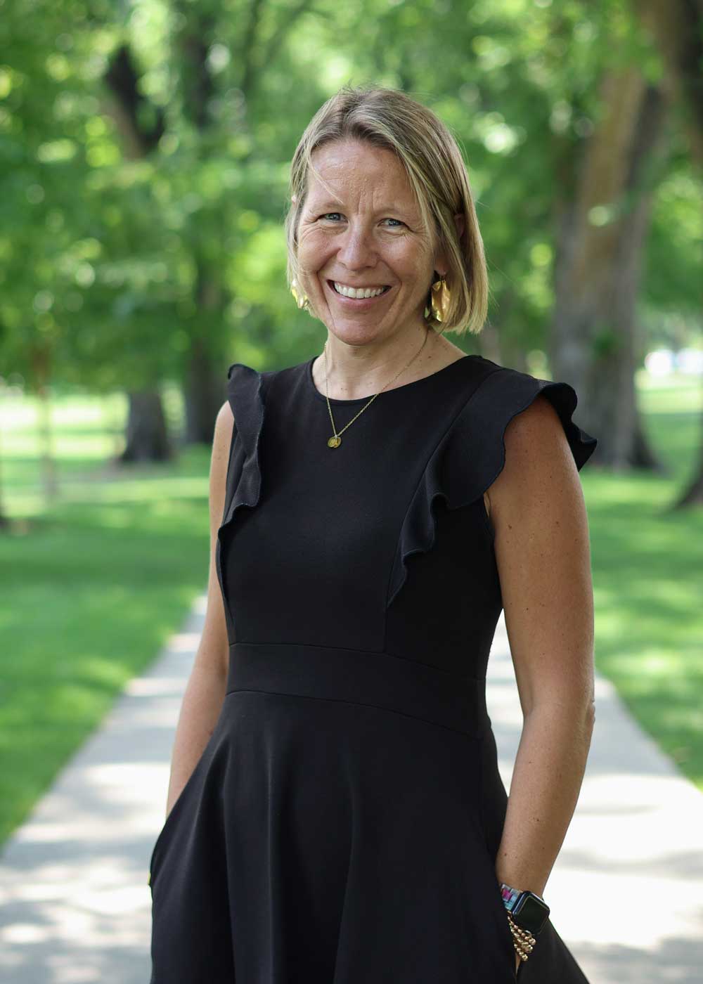 Portrait of Heather standing outside