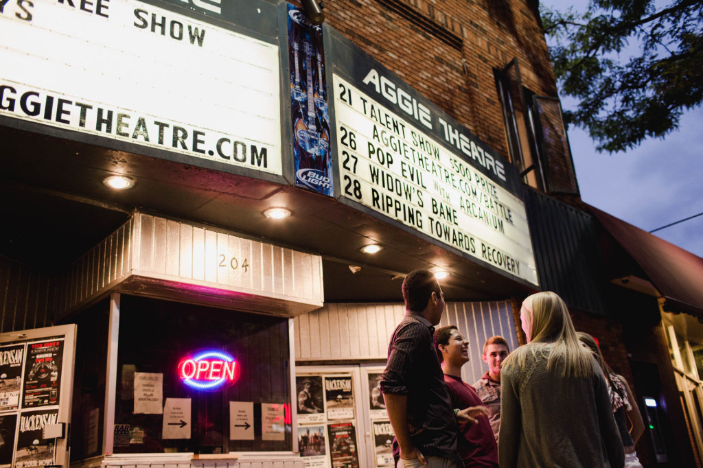 People standing outside music theatre in Fort Collins