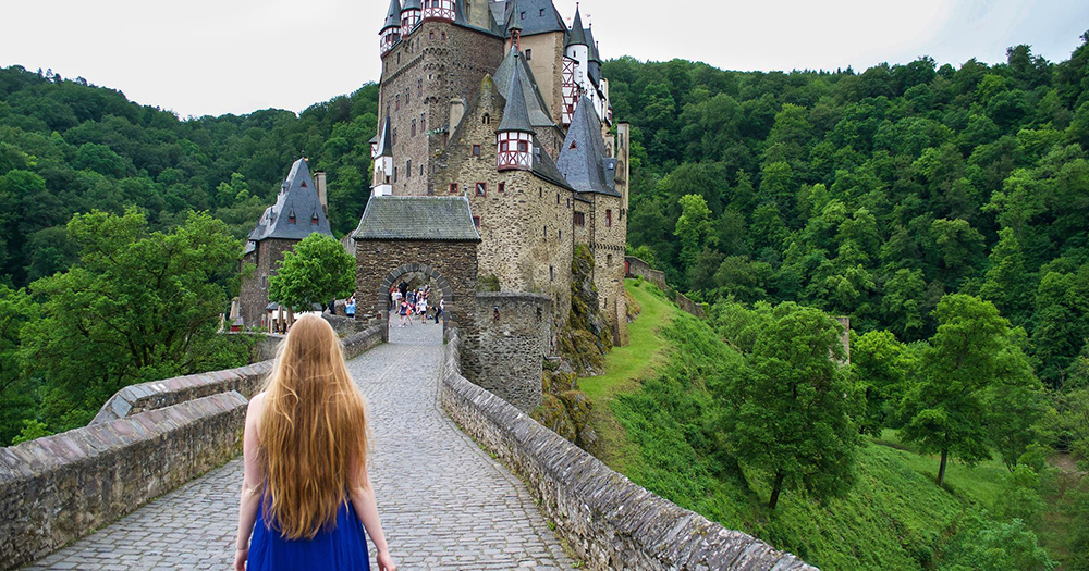 girl looking at castle