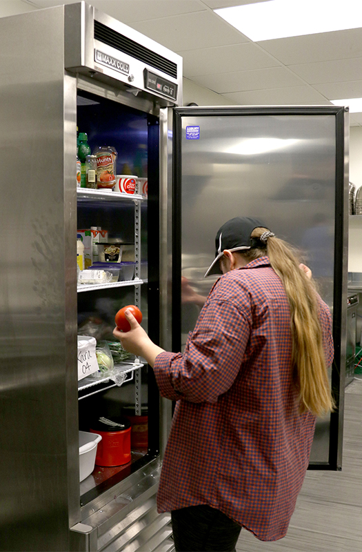 An industrial-size fridge holds all the fresh ingredients students need to create appetizing, healthy meals.