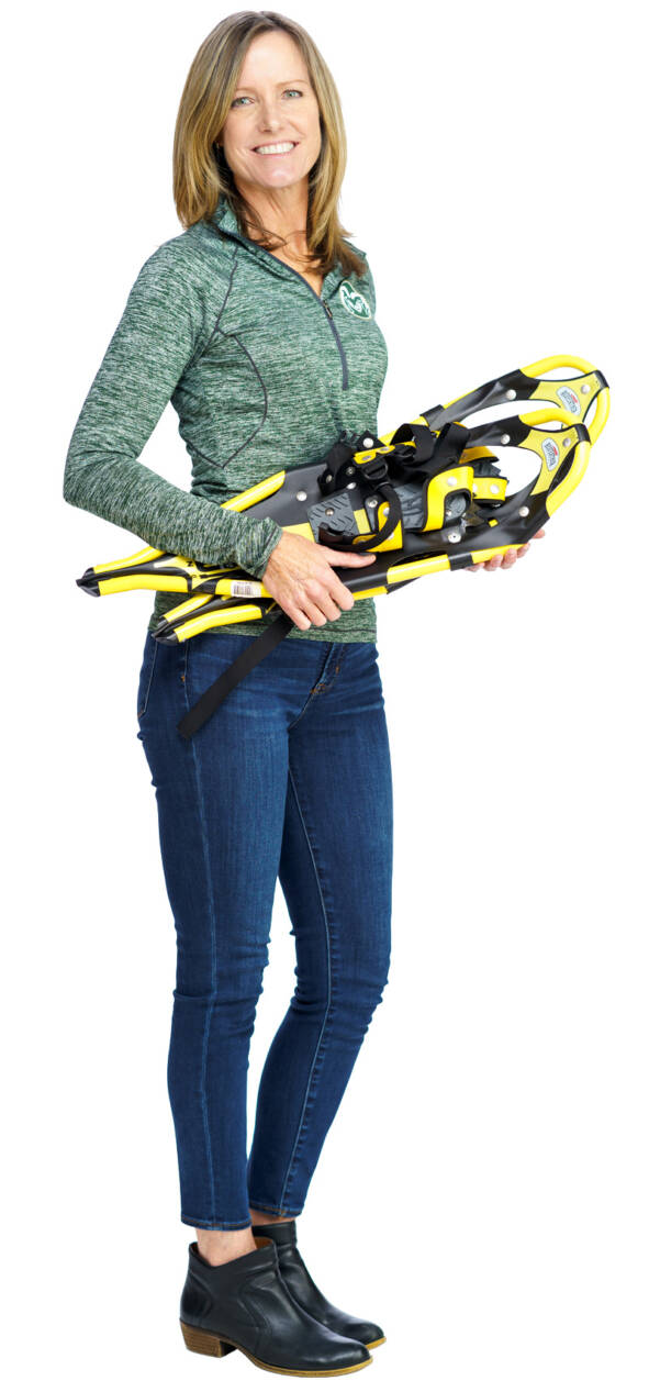 Cathy Braunlin holding snowshoes