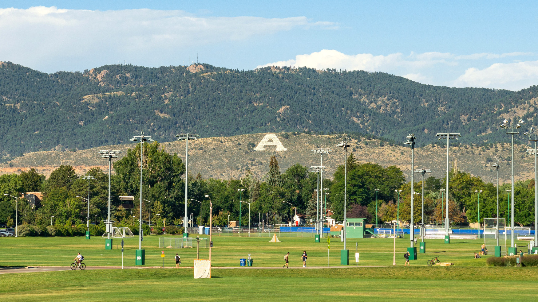 View of campus with foothills in background. Foothills are painted with a giant A for Aggies