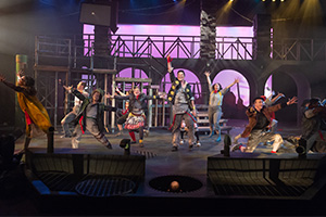 Students perform in a high-tech production in the university theatre